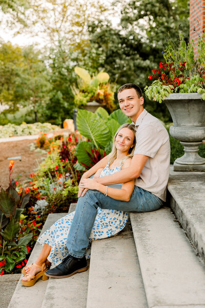 Fall outdoor couple  portrait in front of colorful fall leaves