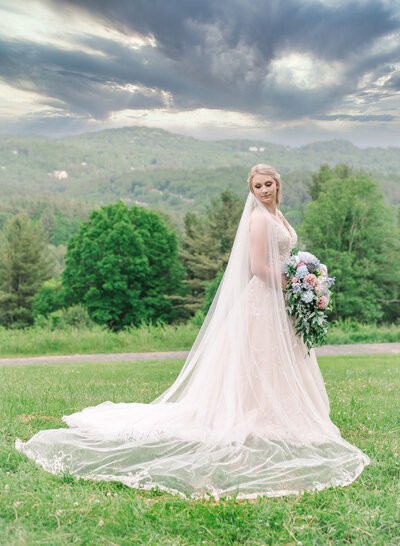 bride looking over her shoulder in wedding dress