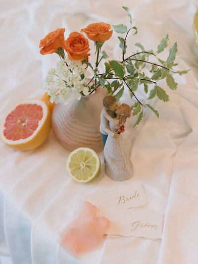 Colorful hand calligraphy on hand made cotton paper used as wedding place cards