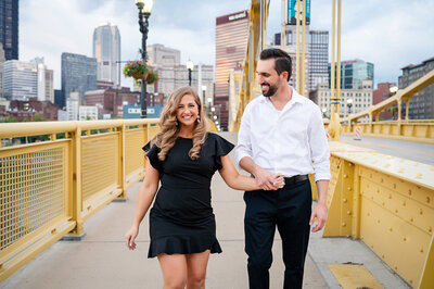 fun pittsburgh engagement photo on andy warhol bridge