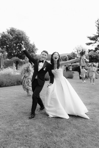 Luxury wedding in Europe – sophisticated bride in a modern wedding gown and groom in a timeless suit.