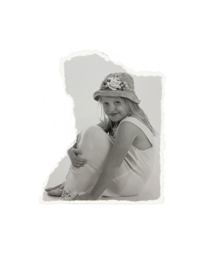 torn image of little girl with hat sitting