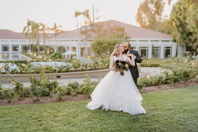 Golden hour photo of bride and groom on the lawn at the nixon library in yorba linda california orange county