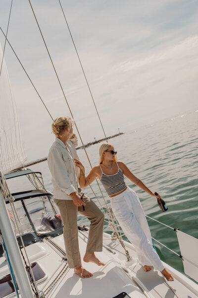 girl and boy on sailboat