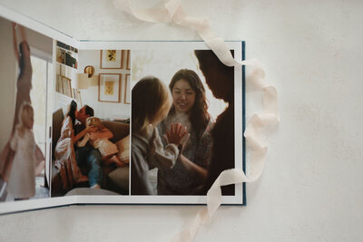 family photo album showing in-home session by huntsville photographers fauna & film