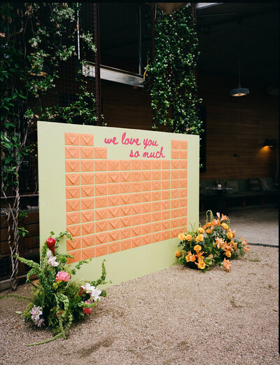 This "we love you so much" wedding sign was one for the books! Created by Austin's best wedding stationer and signage creator, Eventive Designs.