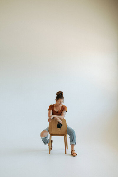 woman sitting on chair