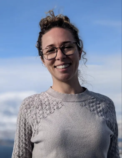 Hayley O'Brien, a beautiful young woman with glasses and a big smile.