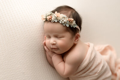 sleeping newborn girl