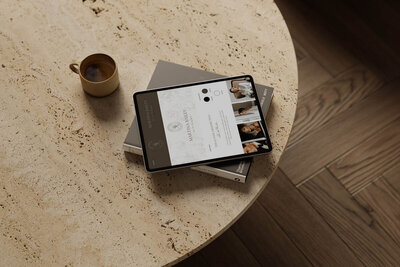 iPad mockup showing Martina Bailey wedding photography Canva brand kit with neutral tones, elegant font choices, and fine art imagery—ideal for creatives building a romantic, refined digital presence.