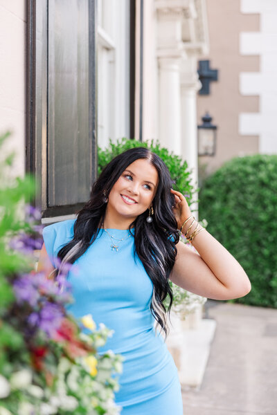 Senior girl fixing her hair
