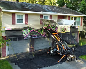 view of Catch-All protecting the property and Equipter raised to the roof for debris to be collected in