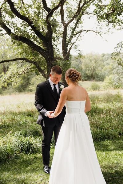 Your go-with-the-flow Minnesota wedding photographer. Real laughs, big love, and true-to-life photos — because forever should feel fun.