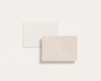Custom Branding for a Wedding photographer with a romantic style using soft pink and gold colors together with a script font to create elegance.