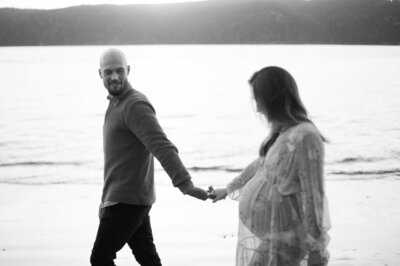 A tender scene from a maternity session in Sydney by Tealily at Palm Beach