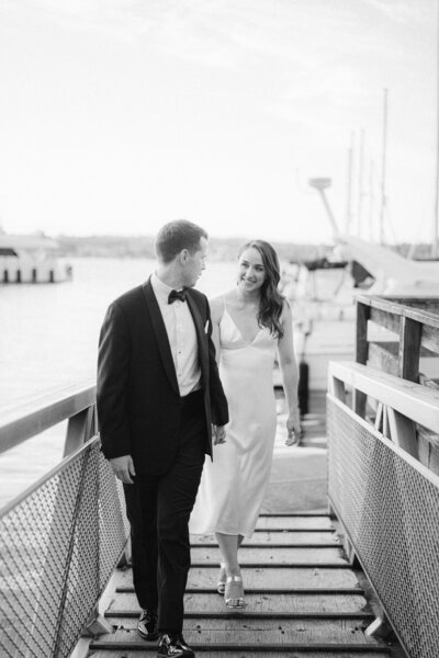 Bride and groom walk up memorial steps at their DC wedding