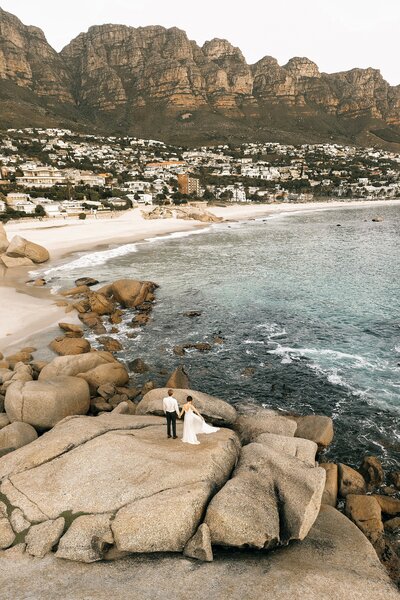 Bride and groom walk up memorial steps at their DC wedding