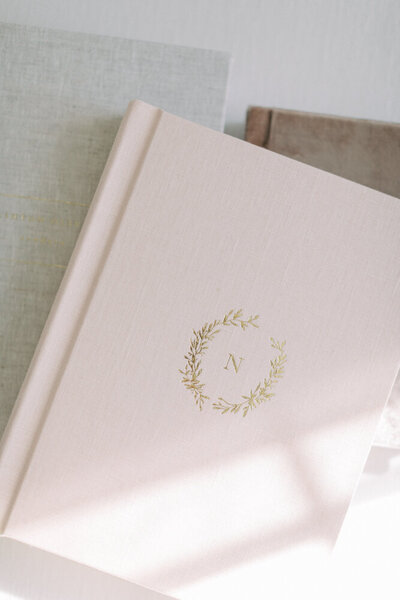 linen pink newborn session album made by photographer milwaukee wi Talia Laird Photography