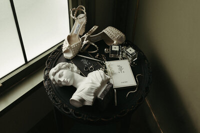 wedding details flatlay with luxury details