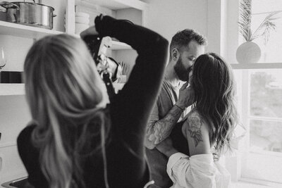 man hugging woman from behind