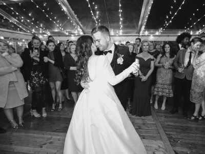Bride and groom first dance in marquee