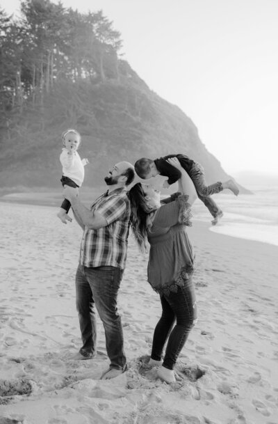 Hope's family of four on the beach.