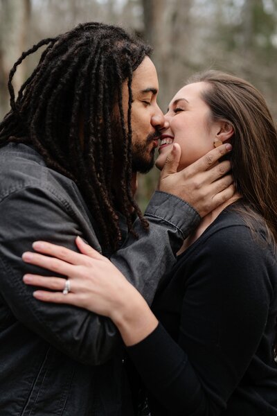couple embracing during a session in virginia beach