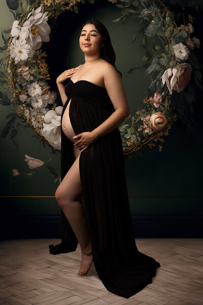 Posed studio maternity photography for show casing baby bump