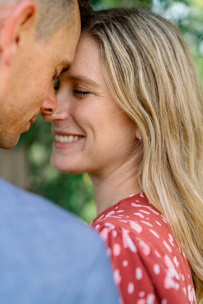 couple embraces for santa barbara engagement photographer
