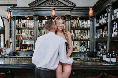 Modern bar themed engagement session in long beach at la traviata