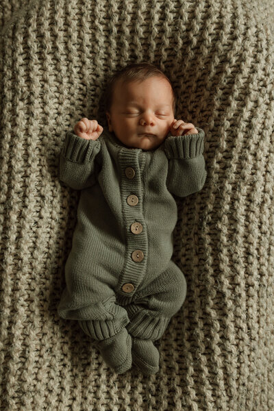 San Antonio newborn baby lying down and yawning