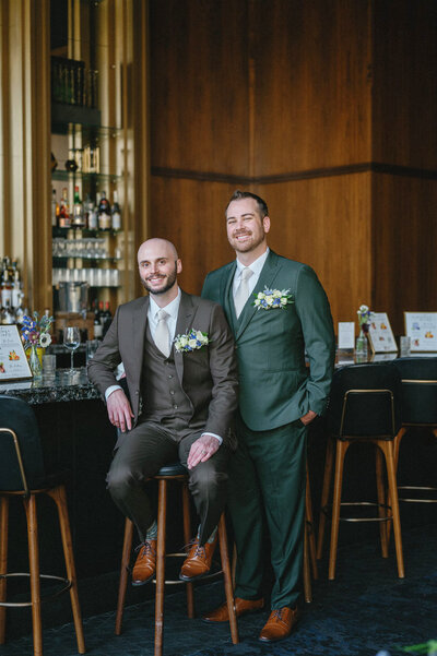 bride and groom with their dog at the Living Room Omaha