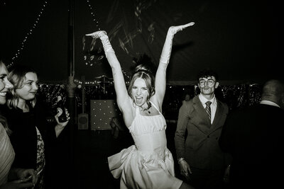 people dancing in a house having fun