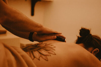 Strong hands provide relief from pain and stiffness, massaging comfort into the back