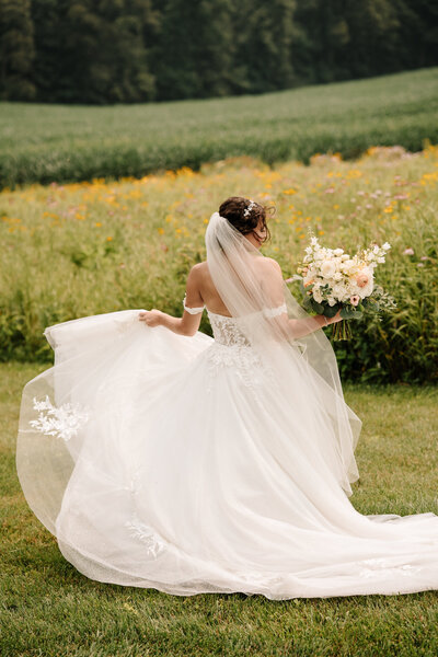 Bride in Field with Bouquet