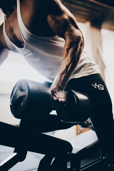 Man performs strength training