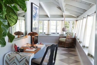 Organic wrap-around porch design by interior designer Dana Triano of Dana Triano Designs