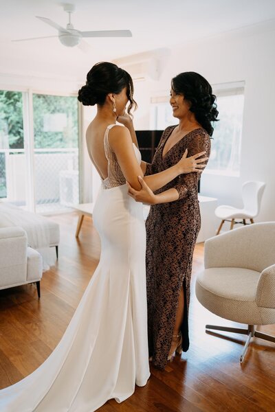 bride and mother of the bride embracing hair and makeup by eva hair and makeup sydney