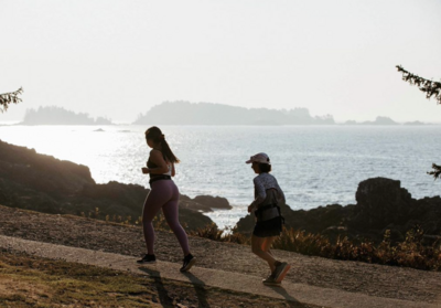 Two lady runners running 10k by the ocean