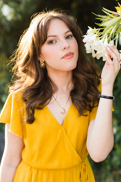 Scottsdale senior photographer captures high school senior girl  with flowers
