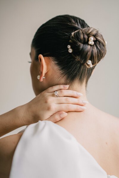 bride getting ready portrait at her Arlington top of the town wedding in northern Virginia