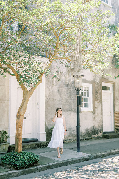 girl walking down street in charleston