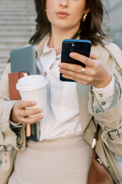 Woman writing and typing Aspire Desire Coaching