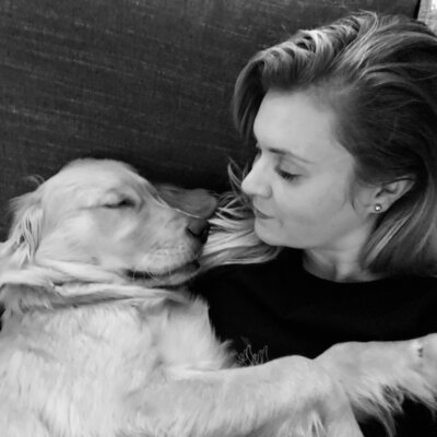 Photo of a cozy dog curled up peacefully – symbolizing safety, regulation, and emotional connection in trauma therapy with Jessie Withers, online across California