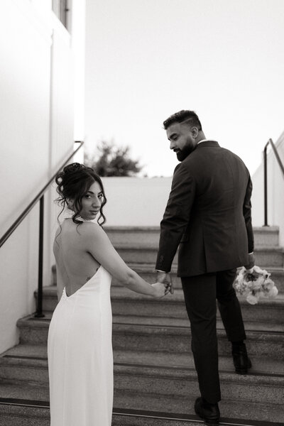 Chic rooftop elopement at The Darling Hotel in Visalia, California, featuring modern bridal fashion and editorial portraits by a luxury wedding photographer.