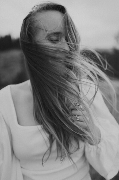 woman with hair blowing in the wind