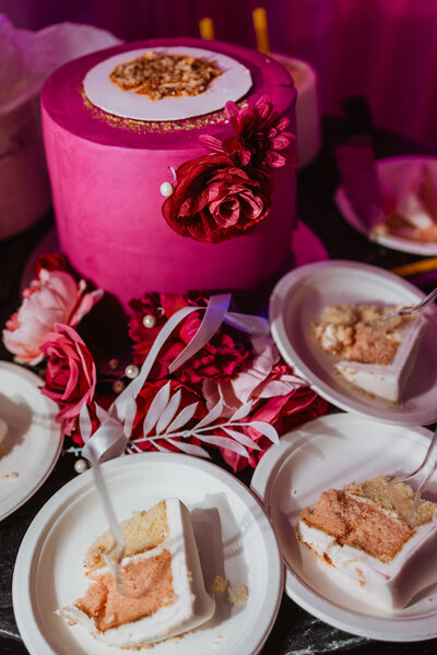 A birthday cake and cake slices 