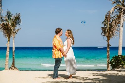 Photo of couple on the beach with all inclusive destination wedding packages with CC Vacations