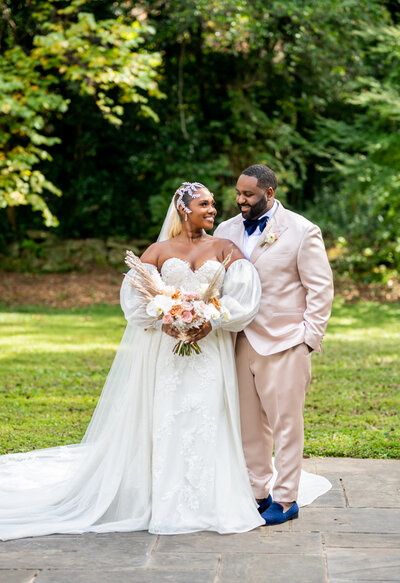 Bride and groom portraits at their Atlanta  garden wedding