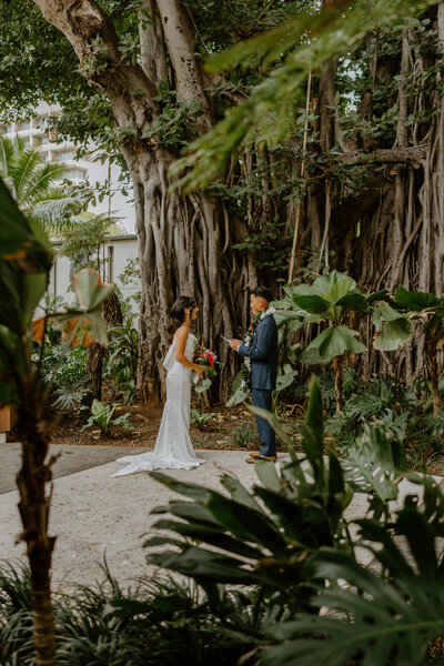 bride and groom exchanging vows